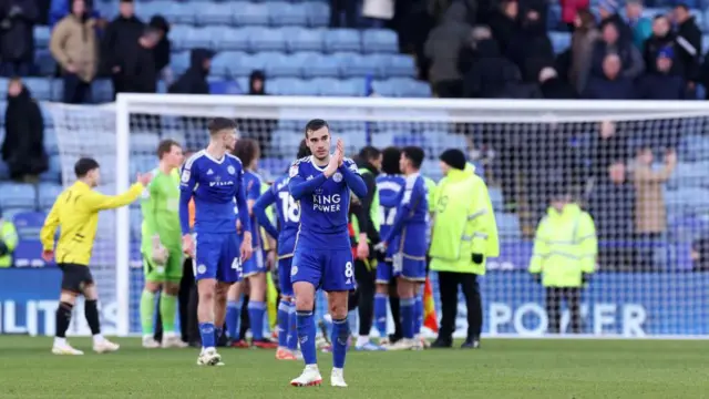  Harry Winks of Leicester City applauds the fans