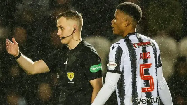 Referee Calum Scott and St Mirren defender Richard King