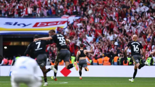 Adam Armstrong of Southampton runs towards the Southampton fans at full time