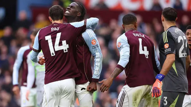 Aston Villa players celebrate 
