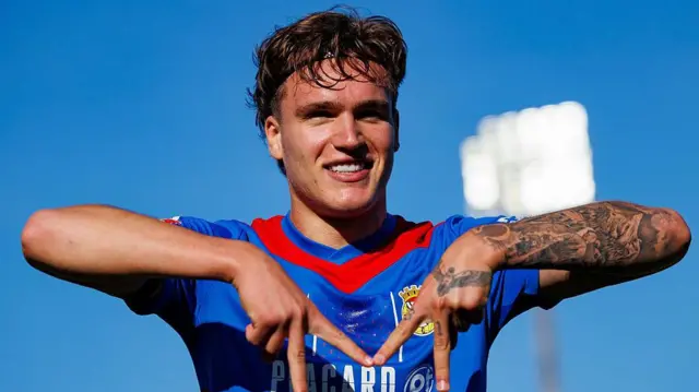 Marko Milovanovic celebrates after scoring a goal 