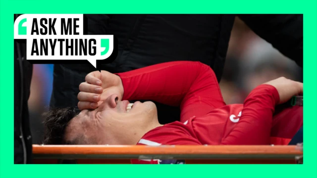 Lisandro Martinez being stretchered off with the 'Ask Me Anything' border