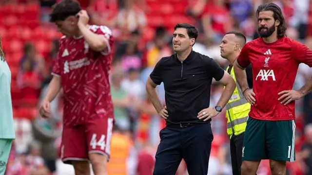 Liverpool head coach Andoni Iraola and goalkeeper Alisson Becker