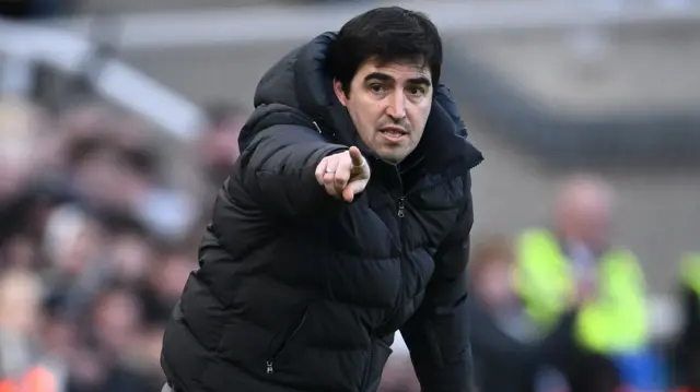 Andoni Iraola points instruction from touchline