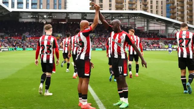 Bryan Mbeumo and Yoane Wissa celebrate a goal for Brentford