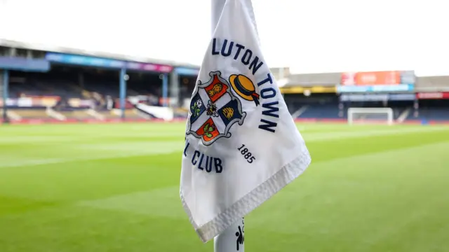 Luton Town's club badge on a corner flag at Kenilworth Road