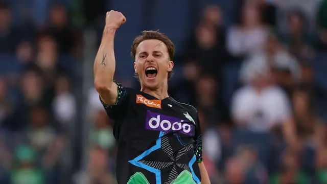 Tom Curran punches the air in delight while playing for Melbourne Stars