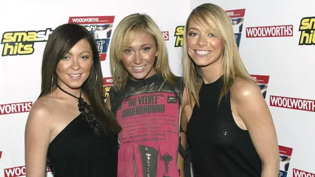 Members of Atomic Kitten pose for a photograph