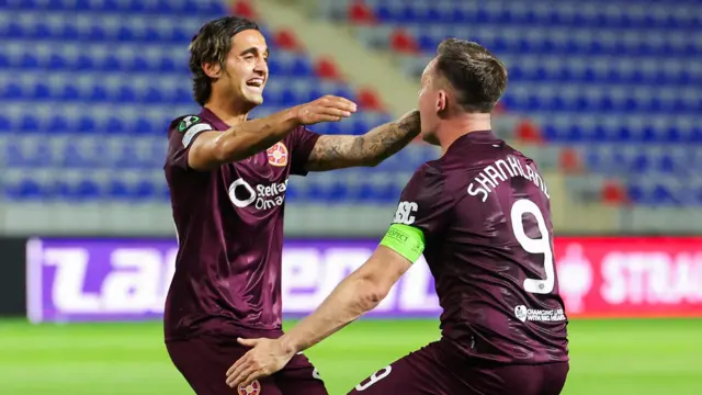 Yan Dhanda and Lawrence Shankland celebrate