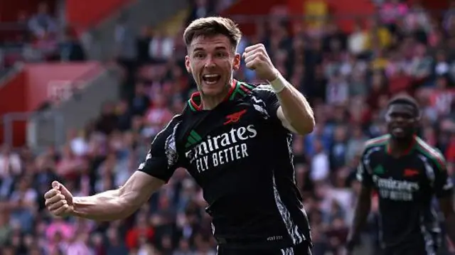 Kieran Tierney of Arsenal celebrates scoring his team's first goal during the Premier League match between Southampton FC and Arsenal FC at St Mary's Stadium 