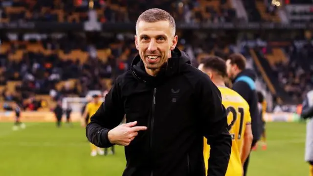 Gary O'Neil pointing at himself while celebrating with Wolves