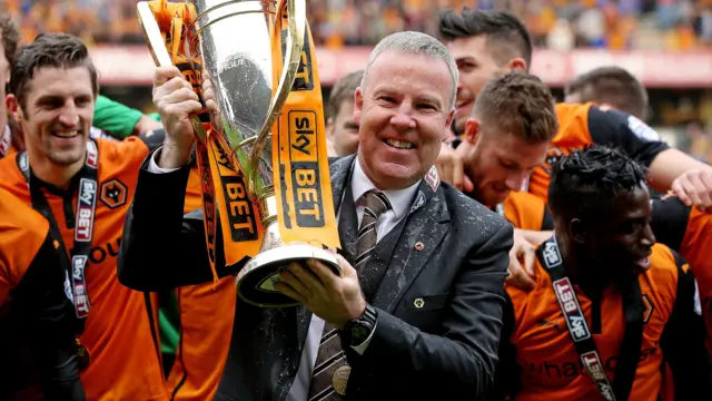 Kenny Jackett holds the League One trophy