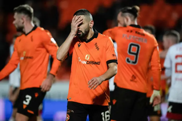 Aziz Behich looks dejected