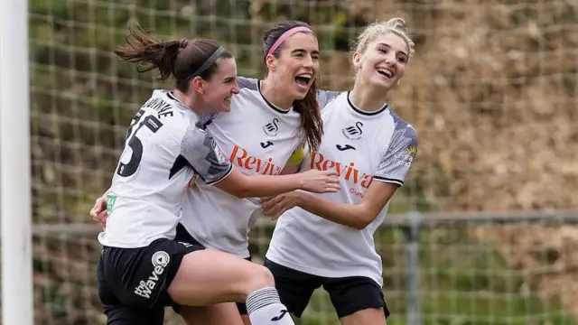 Katy Hosford celebrates a goal for Swansea City Women with team-mates last March