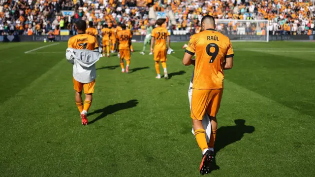 Wolves players walking over to their away support after their win over Preston North End at Deepdale on Saturday