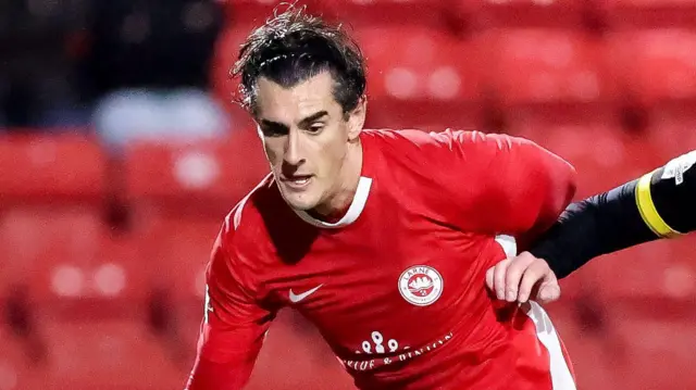 Matt Ridley in action for Larne