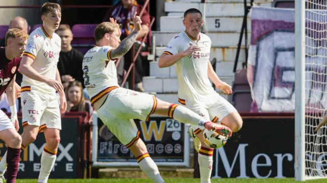 Motherwell's Callum Slattery has the ball in the net but VAR rules it out for offside on Dan Casey during a William Hill Premiership match between Heart of Midlothian and Motherwell at Tynecastle Park