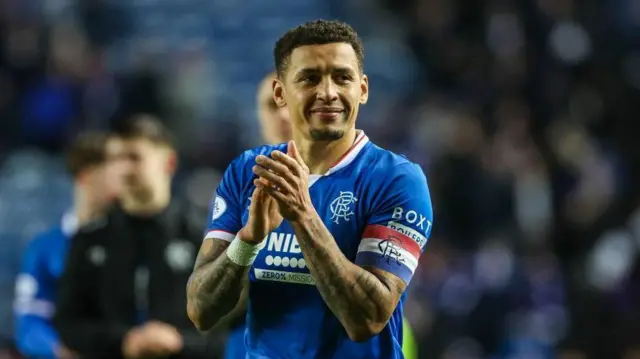 James Tavernier claps Rangers fans after their Premiership victory over Dundee