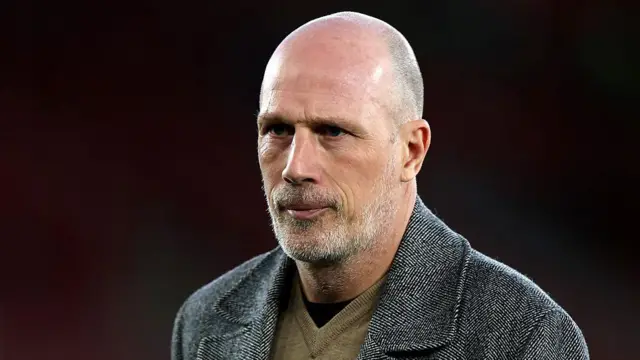 Philippe Clement, Manager of Norwich City, looks on in his grey jacket 