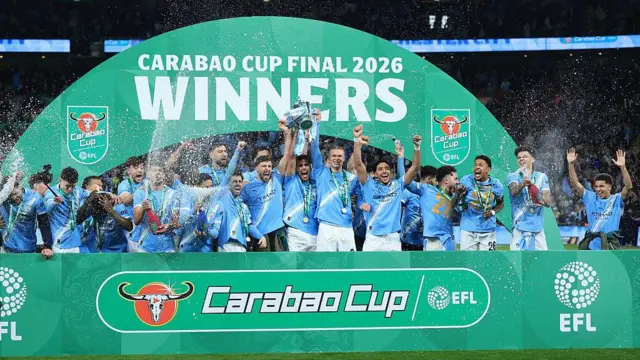 Manchester City celebrate with the EFL Cup