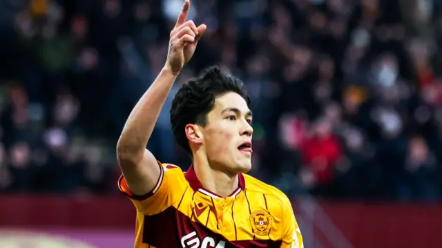 Motherwell winger Elijah Just celebrates