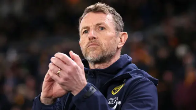 Oxford United boss Gary Rowett looks on 
