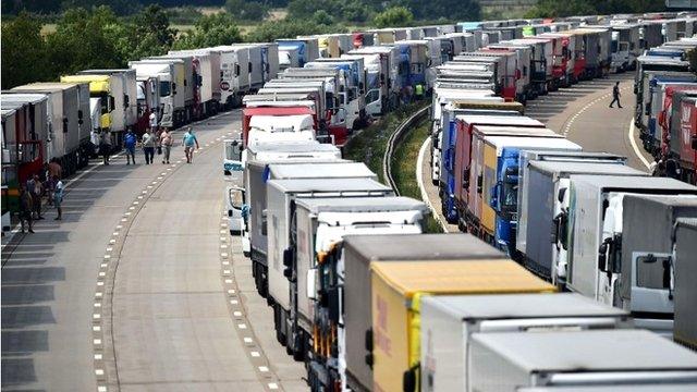 Trucks are parked on both the northbound and southbound carriageways of the M20