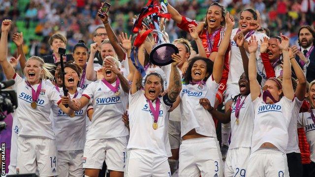 Lyon Women celebrate winning the Champions League last season