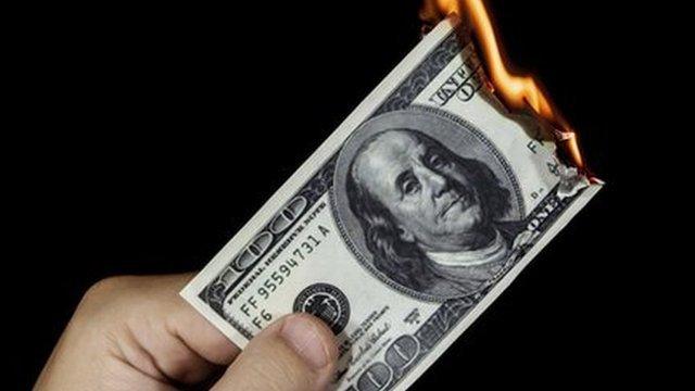 burning 100 dollars