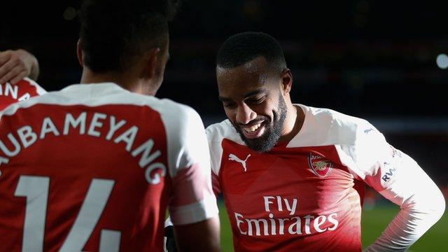 Alexandre Lacazette celebrates with Pierre-Emerick Aubameyang after Arsenal score against Manchester United