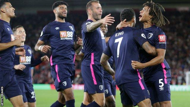 Bournemouth players celebrate Nathan Ake's first goal