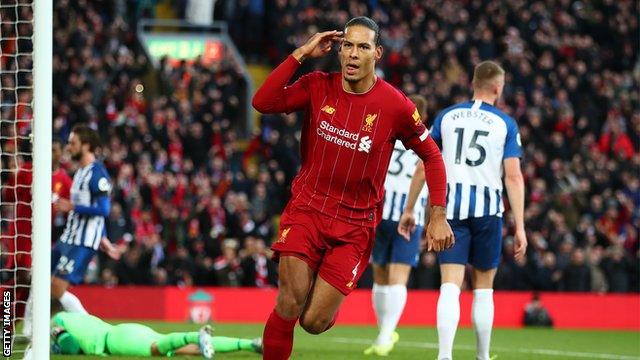 Liverpool defender Virgil van Dijk celebrates scoring against Brighton