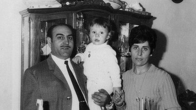 Juan Luis Moreno as a baby with his adoptive parents