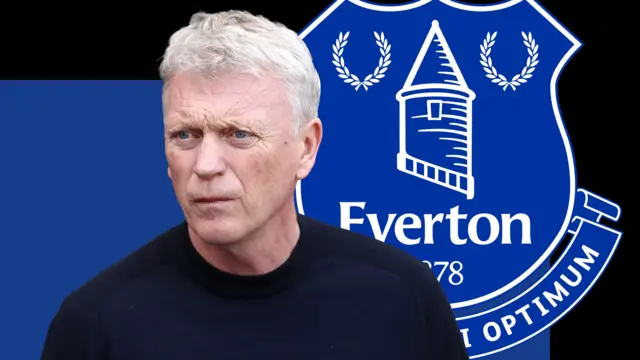 An image of David Moyes with the Everton badge in the background. 