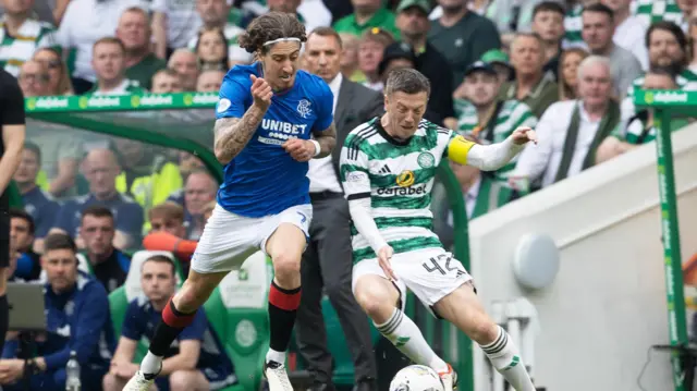 Callum McGregor battles with Fabio Silva