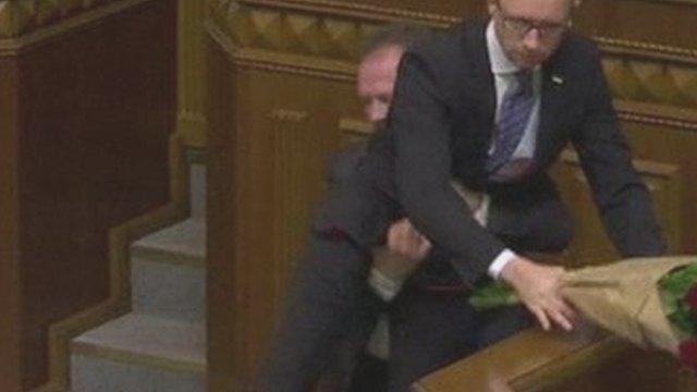 Arseniy Yatsenyuk lifted off his feet