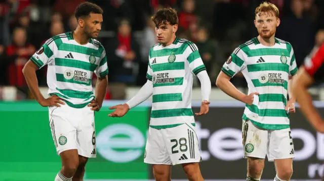 Celtic's Auston Trusty, Paulo Bernardo and Liam Scales look dejected