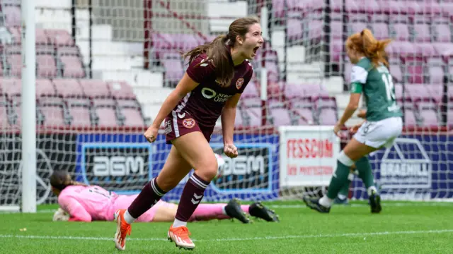 Jessica Husband of Hearts celebrates after she scores the second goal during the ScottishPower Women's Premier League 1 match between Hearts Women and Hibs Women at Tynecastle Park
