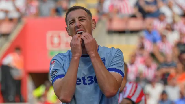 Robert Bozenik reacts after missing a chance at goal during Stoke City's game against Southampton at St Mary's