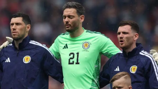 Scotland's Craig Gordon sings the national anthem