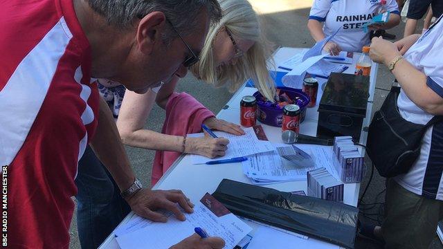 Fans began to sign up to help clean Gigg Lane on Tuesday morning during the meeting