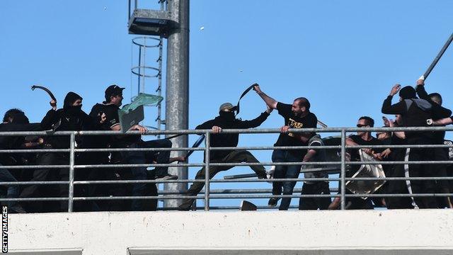 Fans fought on a bridge leading to the stadium