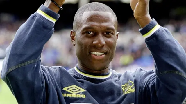 Kevin Campbell smiles before an Everton match