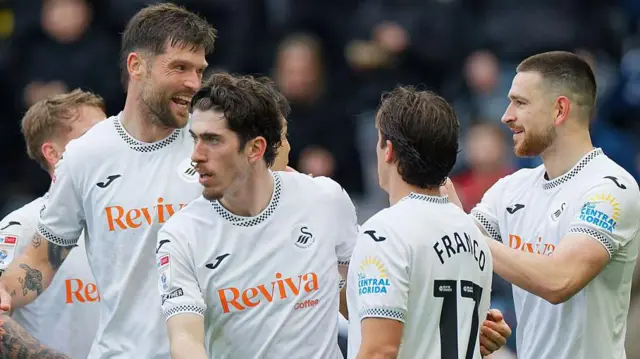 Swansea players celebrate Zan Vipotnik's goal against Stoke