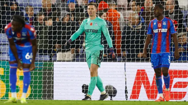 Crystal Palace players look dejected after conceding a goal