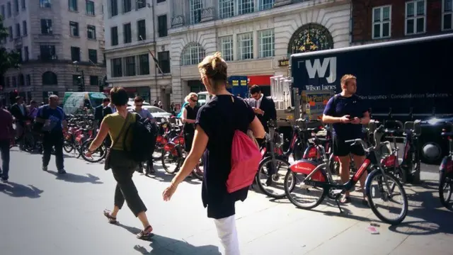 Queue to return public rental bicycles at Cheapside, London