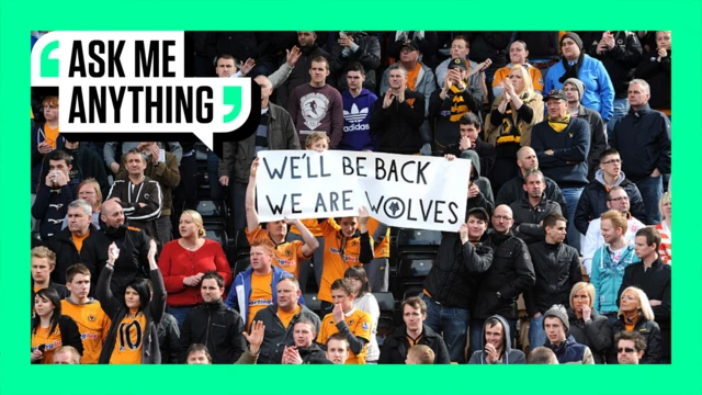 Wolves fans holding up a 'We'll be back, we are Wolves' banner