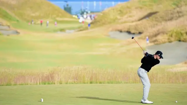 Morgan Hoffmann hits a tee shot