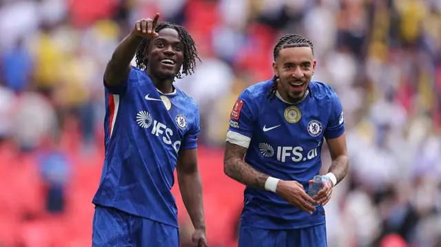 Romeo Lavia and Malo Gusto reacting for Chelsea