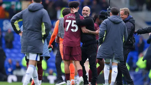 Nico O'Reilly and Pep Guardiola